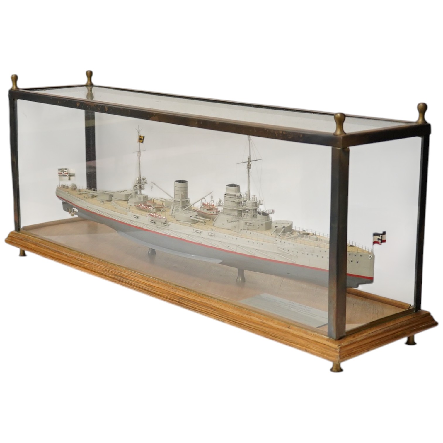 A cased Colin Freeman model of a German battle cruiser, S.M.S. Seydliyz, a well detailed model, with plaque describing the technical details and history regarding her involvement at the battle of Jutland, case 75 x 19.5